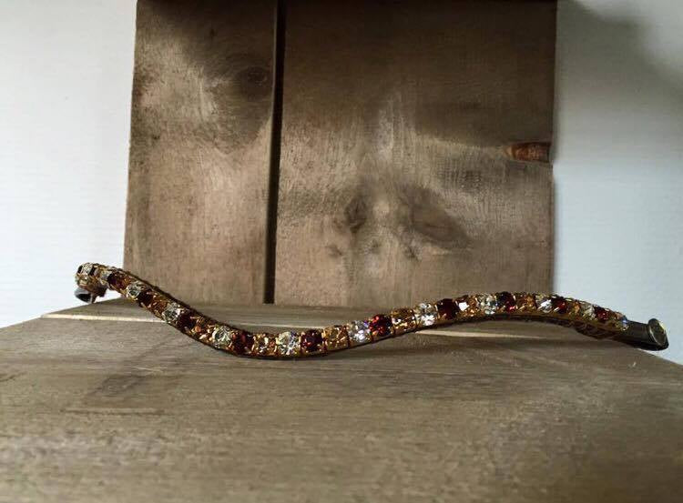 Frontal en cristaux rouge, or et argent